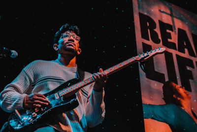 Guy on electric guitar