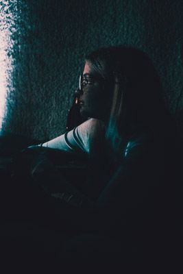 Girl sitting on stage